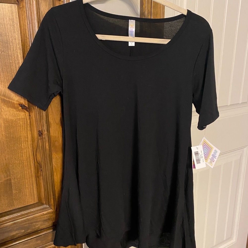 Brand New with Tags - Lularoe perfect T in black. XS fits sizes 4-6/8